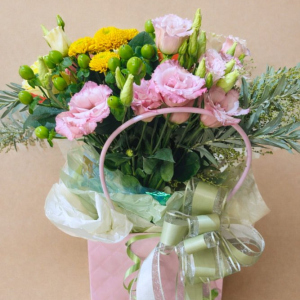 pink box contining various coloured flowers