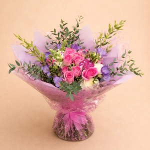 Pink roses posy with white and blue flowers