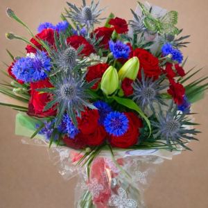 Naiomi roses, lillies and cornflower bouquet with mixed foliage