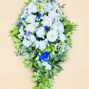 funeral bouquet with white and blue flowers