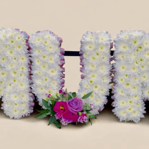 mum letters in white yellow flowers with corner and centre sprays