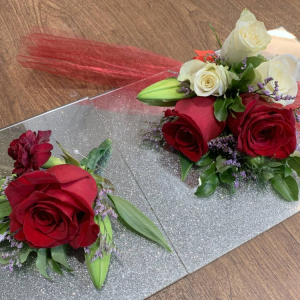 small bouquets placed on mirrors