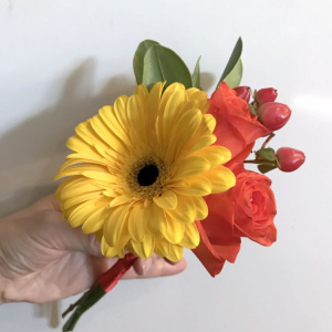 small posy with red and yellow flowers